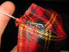 Schnüre an Ecken vernäht